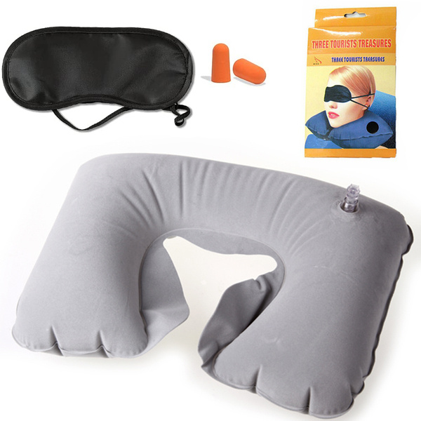 Inflatable croissant travel pillow + blindfold