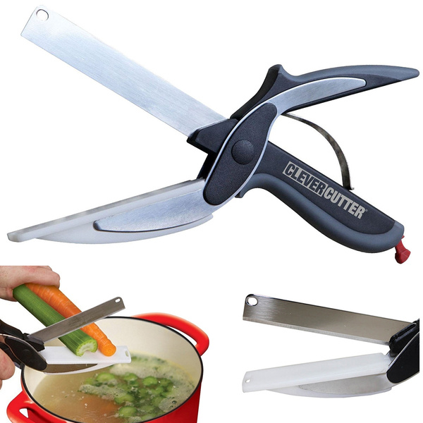 Kitchen scissors for vegetables, meat and fruit with a board