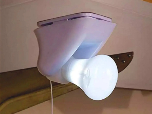 Portable battery-powered light bulb self-adhesive lamp