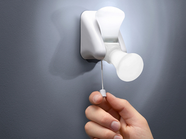 Portable battery-powered light bulb self-adhesive lamp