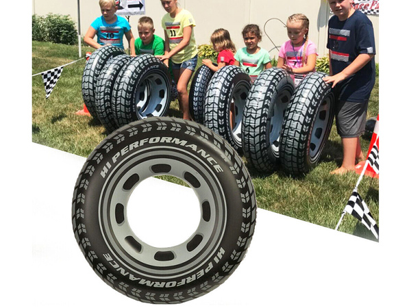 Grande roue gonflable de 70 cm permettant à un enfant adulte de nager dans l'eau de la piscine