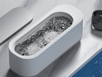 Vibration washer for cleaning jewellery eyeglasses