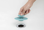 Silicone plug with a strainer for the sink