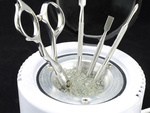 Steriliser for metal instruments ball beads
