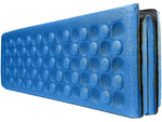 Foam folding hiking mat thermal seating carimata in the mountains