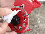 Hand-held cable stripper with adjustable cutting action
