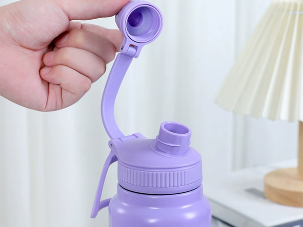 Termo térmico con asa, capacidad 700 ml, para bebidas frías y calientes.