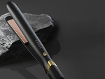 Ceramic hair straightener with adjustable 2in1 curls and straightens hair 140-220°c
