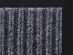 Rubberized doormat for shoes under the front door of the house 60 x 90