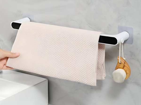 Wall-mounted bathroom towel rail non-invasive adhesive mounting