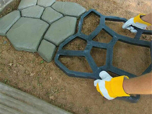 Mold for stone paving stone concrete cat's head