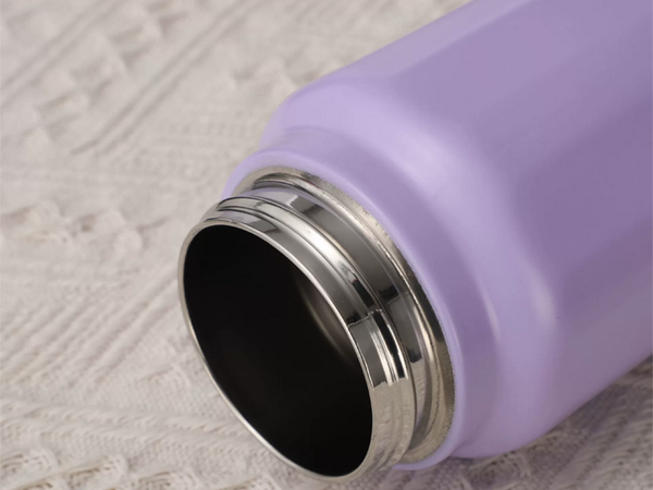 Termo térmico con asa, capacidad 700 ml, para bebidas frías y calientes.