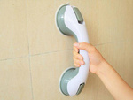 Support à ventouse pour main courante de salle de bain