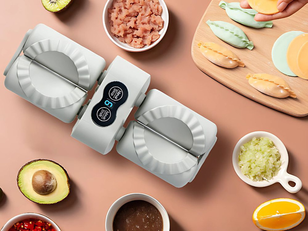 Machine électrique automatique double pour faire des raviolis