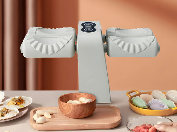 Machine électrique automatique double pour faire des raviolis