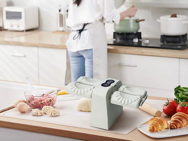 Machine électrique automatique double pour faire des raviolis