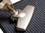 Rubberized doormat for shoes under the front door of the house 60 x 90
