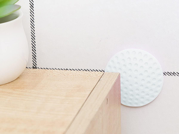Door handle bumper self-adhesive to walls