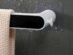 Wall-mounted bathroom towel rail non-invasive adhesive mounting