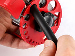 Hand-held cable stripper with adjustable cutting action