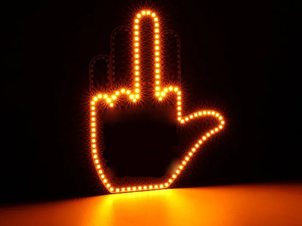 Gesture signalling hand on the rear window of a car middle finger led remote control