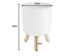 Flowerpot flower pot standing on legs for the house garden standing white