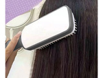 Self-cleaning hair brush for combing anti-static combing